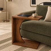 Velto Side Table brown beside sofa with tablet